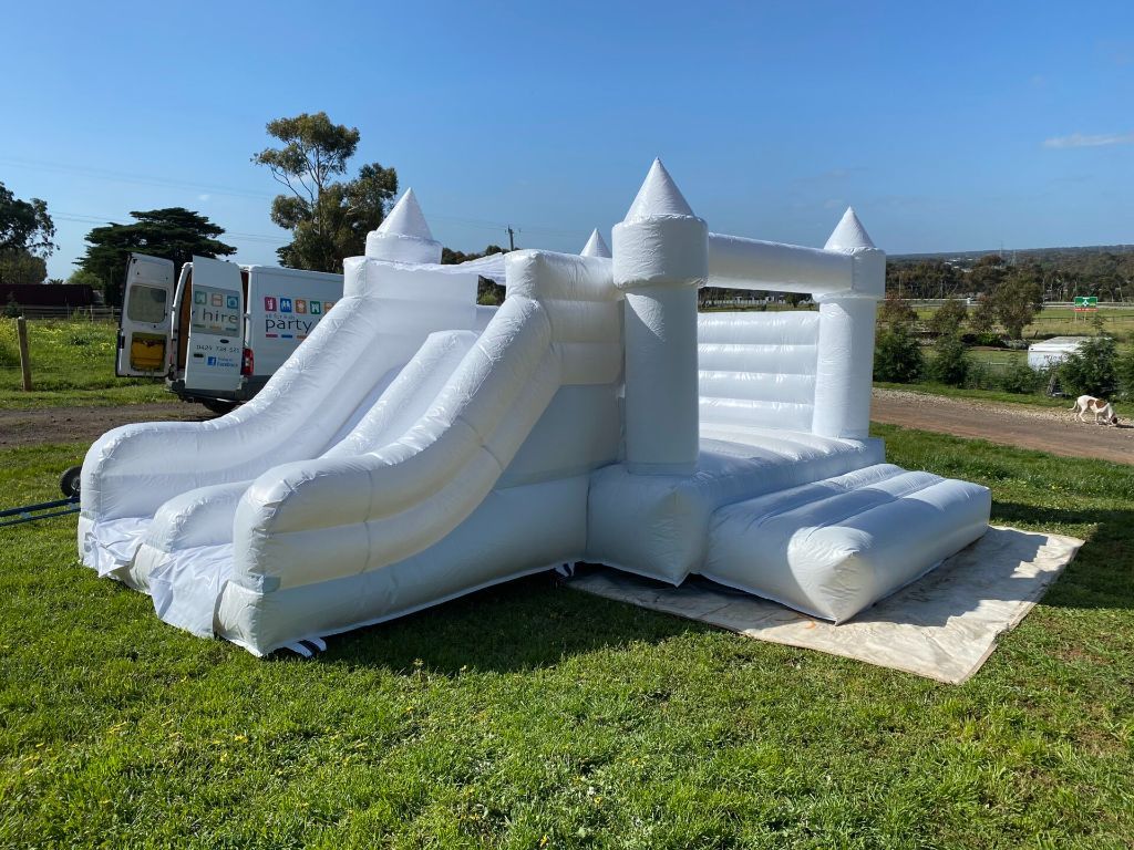 White wedding themed jumping castle with elegant design